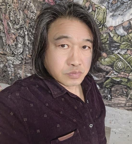 画家靳军一乡情如哥